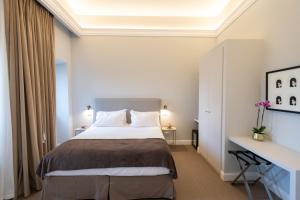 Posteľ alebo postele v izbe v ubytovaní Domus 21 Luxury Suites