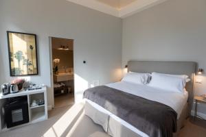 Posteľ alebo postele v izbe v ubytovaní Domus 21 Luxury Suites