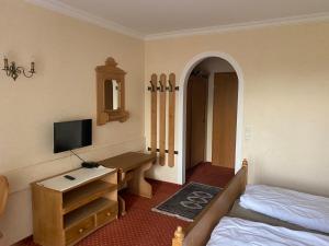 TV a/nebo společenská místnost v ubytování Xundheits Hotel Garni Eckershof