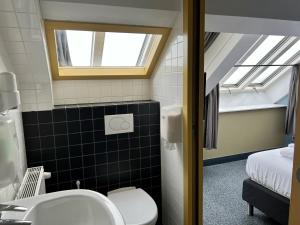 Koupelna v ubytování Hotel Oostereiland