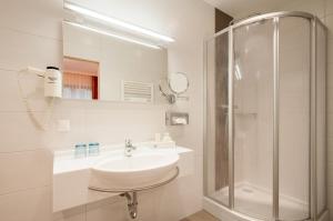 Koupelna v ubytování Hotel Landhof Simeter GMBH