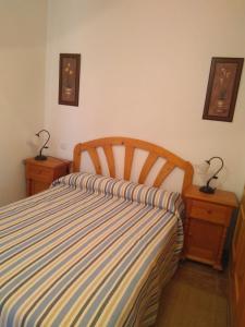 Postel nebo postele na pokoji v ubytování Casa Rural el Maestro II