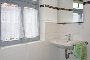 Koupelna v ubytování Ferienwohnung Häckerstub'n Zang + 20 fotografií