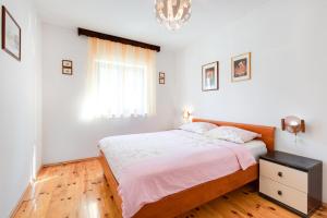 Posteľ alebo postele v izbe v ubytovaní Marica A4