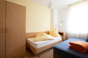 Ένα ή περισσότερα κρεβάτια σε δωμάτιο στο Appartement Huber
