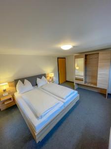 Postel nebo postele na pokoji v ubytování Mountain Hostel City