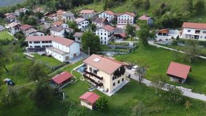 an aerial view of a small village with houses at Apartma Logar in Kobarid