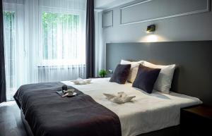Postel nebo postele na pokoji v ubytování Löwen Hotel