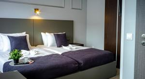 Postel nebo postele na pokoji v ubytování Löwen Hotel