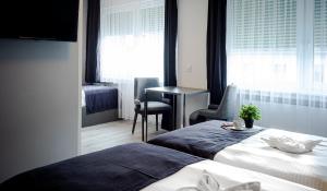 Postel nebo postele na pokoji v ubytování Löwen Hotel