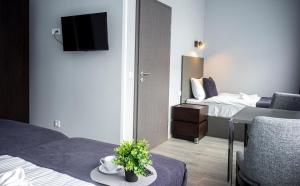 Postel nebo postele na pokoji v ubytování Löwen Hotel