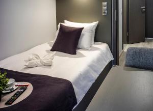 Postel nebo postele na pokoji v ubytování Löwen Hotel