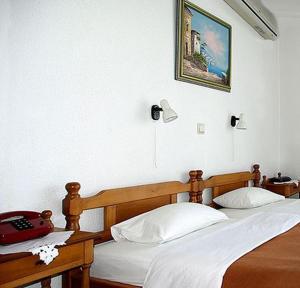 Postel nebo postele na pokoji v ubytování Hotel Helios + 16 fotografií
