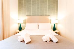 מיטה או מיטות בחדר ב-Minty Stay 3BD Apartment - Triana