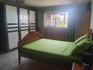 Postel nebo postele na pokoji v ubytování Maison chaleureuse dans un cadre calme et agréable