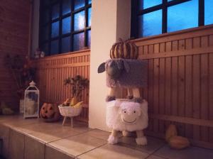 a stuffed sheep standing on top of a building at CHALUPA OSTRAVICE in Ostravice