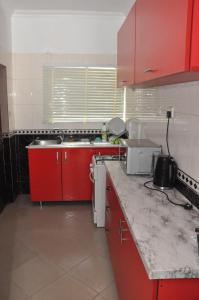 A kitchen or kitchenette at Haute Aparthotel