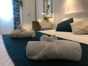 Posteľ alebo postele v izbe v ubytovaní Amurí Room2