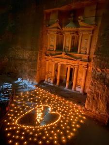 a bunch of lights in front of a building at Petra Sella Hotel in Wadi Musa