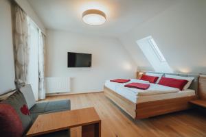 Łóżko lub łóżka w pokoju w obiekcie Weinquartier Pichler-Schober