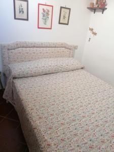 Postel nebo postele na pokoji v ubytování Lo chalet Biancaneve