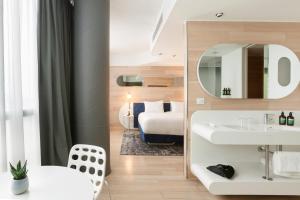 Posezení v ubytování voco Milan-Fiere by IHG