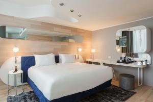 Postel nebo postele na pokoji v ubytování voco Milan-Fiere by IHG