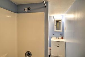 a bathroom with a sink and a mirror at Cozy Damascus Home Less Than 1 Mi to Appalachian Trl in Damascus +18 photos