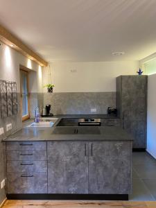 Kuchyň nebo kuchyňský kout v ubytování Ferienwohnung Lisl