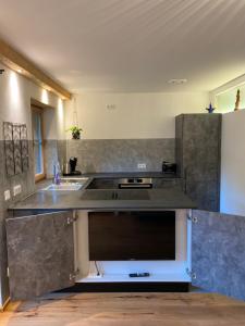 Kuchyň nebo kuchyňský kout v ubytování Ferienwohnung Lisl