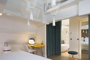 Postel nebo postele na pokoji v ubytování Hotel Dupond-Smith
