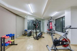 a gym with two treadmills and two exercise bikes at Ayenda Imperial Reforma in Mexico City
