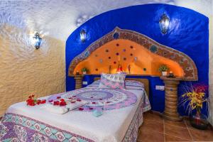 A bed or beds in a room at Cazorla Casas Cueva