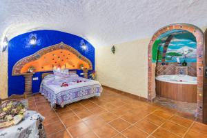 A bed or beds in a room at Cazorla Casas Cueva
