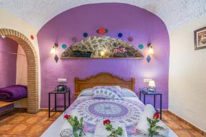 A bed or beds in a room at Cazorla Casas Cueva