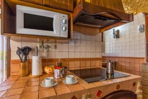 A kitchen or kitchenette at Cazorla Casas Cueva