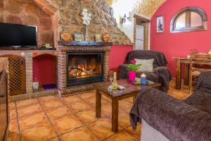 A television and/or entertainment centre at Cazorla Casas Cueva