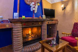 A television and/or entertainment centre at Cazorla Casas Cueva
