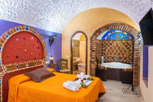 A bed or beds in a room at Cazorla Casas Cueva