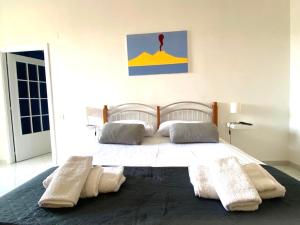 Säng eller sängar i ett rum på Casa Luisa