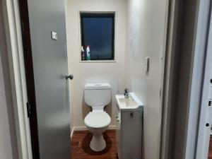 Ванна кімната в Papamoa Holiday Home