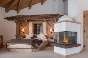 Krevet ili kreveti u jedinici u okviru objekta Hotel Leitenhof 4 Sterne Superior