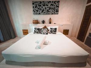 Postel nebo postele na pokoji v ubytování Hotel Casa Margot