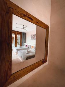 Postel nebo postele na pokoji v ubytování Hotel Casa Margot