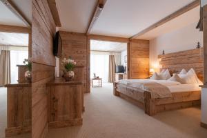 Krevet ili kreveti u jedinici u okviru objekta Hotel Leitenhof 4 Sterne Superior