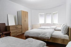 Postel nebo postele na pokoji v ubytování Hotel Park