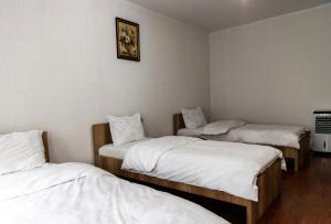 Postel nebo postele na pokoji v ubytování Hotel Park