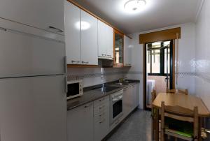 Kuchnia lub aneks kuchenny w obiekcie Playa de Llas