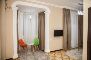Телевизор и/или развлекательный центр в Nice Apartments Tbilisi