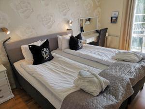 Hotel Carlshamn 객실 침대